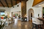 Wet bar & living area leading to dining room